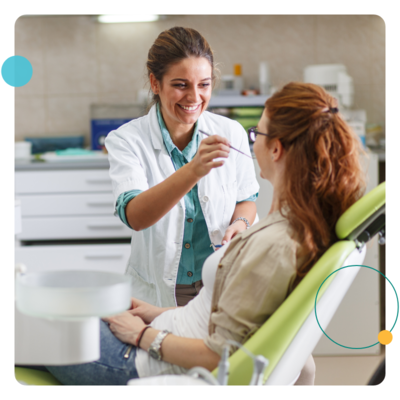 dental practice employee with patient